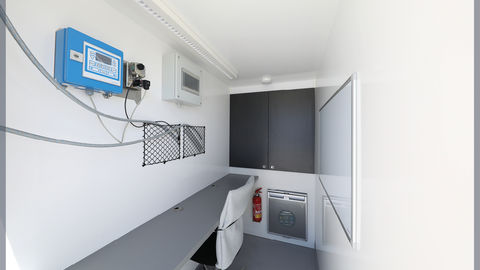 Ergonomic mobile pollution control cradle with office space