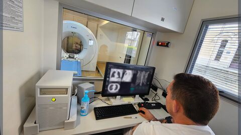 Radiographer performing examinations inside the Pneumobile
