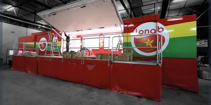 Mobile promotional truck with retractable stage